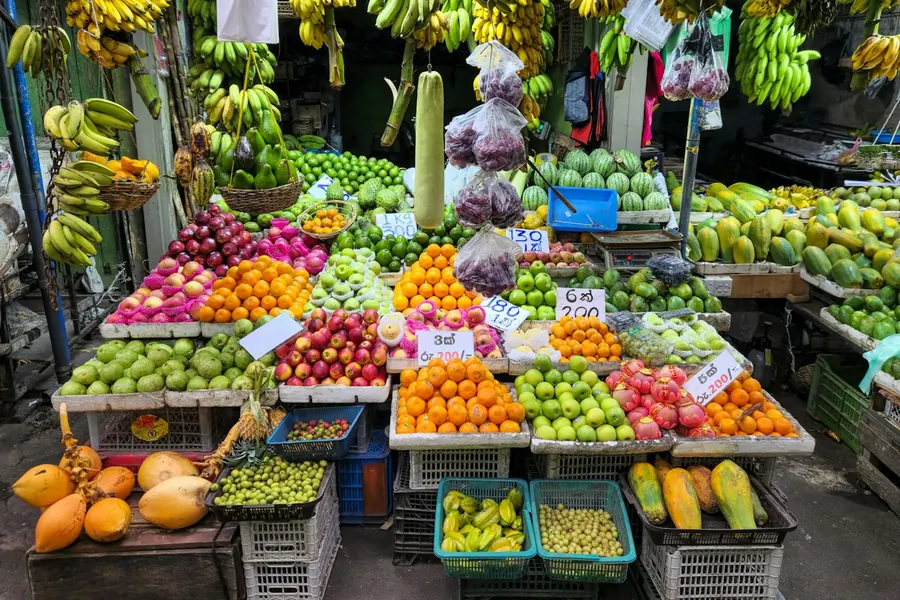 Fresh fruits on display at a market stall
