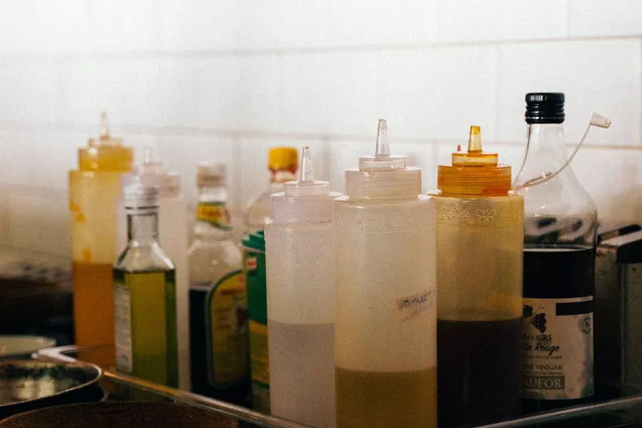 Bottles of cooking oil in a kitchen